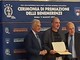 Enrico Garrè premiato dal presidente della Figc Gravina